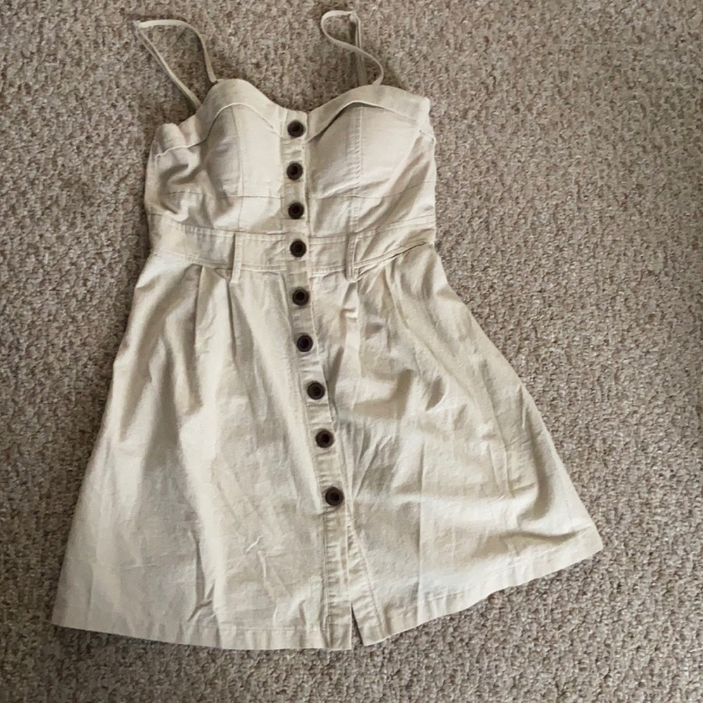 Tan colored dress button up the front with scrunch like material on the back